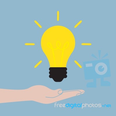 Light Bulb With Hand Holding Stock Image