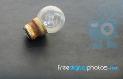 Light Bulbs On Leather Background Stock Photo