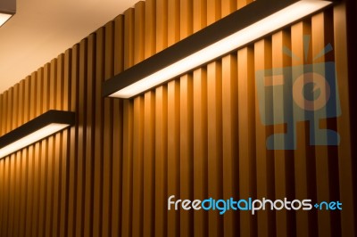 Light On Wooden Plank Wall Stock Photo