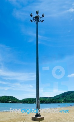 Light Pole On Beach Stock Photo