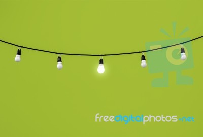 Lightbulbs On Green Stock Photo