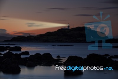 Lighthouse At Dusk Stock Photo