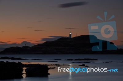 Lighthouse At Dusk Stock Photo