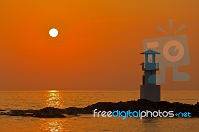 Lighthouse At Sunset Stock Photo