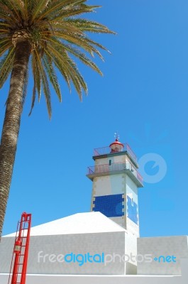 Lighthouse In Cascais, Portugal Stock Photo