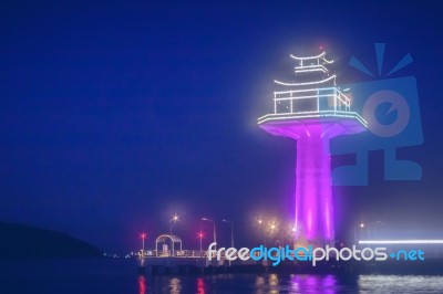 Lighthouse In The Dark Night Stock Photo