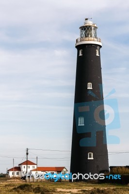 Lighthouse On The Beach At Dungeness Stock Photo