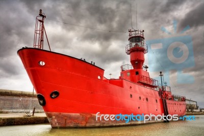 Lighthouse Ship Stock Photo