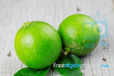 Lime On Wooden Stock Photo