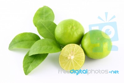 Limes Fruit And Leaf On White Background Stock Photo