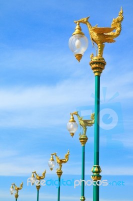 Line Of Thai Style Light Pillar With Blue Sky  Stock Photo