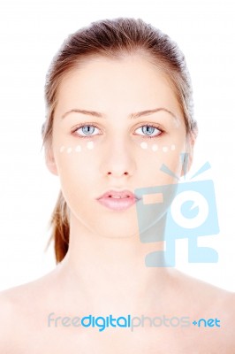 Liquid Powder On Woman's Face Stock Photo