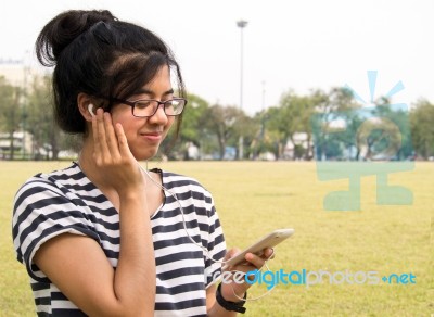 Listening To Music Stock Photo