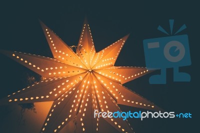 Lit Up Glowing Christmas Star Background Stock Photo