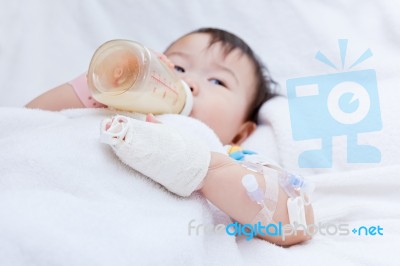 Little Asian Girl Lying  On A Medical Bed Stock Photo