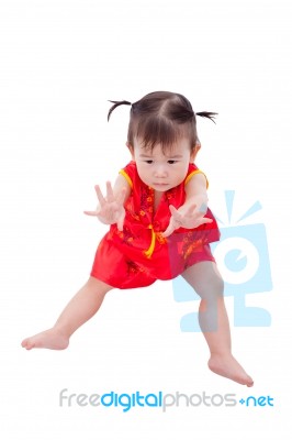 Little Asian Girl (thai) In Traditional Chinese Cheongsam Stock Photo