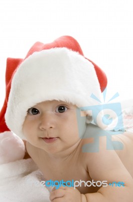 Little Baby Wearing Santa Cap Stock Photo