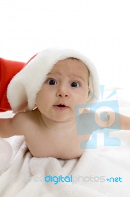 Little Baby Wearing Santa hat Stock Photo