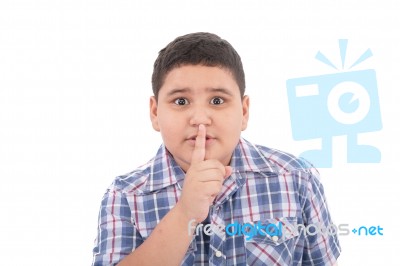 Little Boy With Silence Gesture Stock Photo