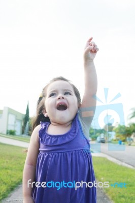 Little Child Pointing Sky Stock Photo