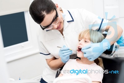 Little Girl At Dental Clinic Stock Photo