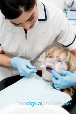 Little Girl At Dental Clinic Stock Photo