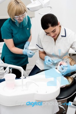 Little Girl Examined By Dentist Stock Photo