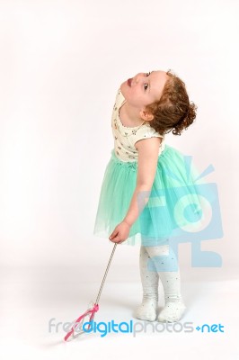 Little Girl Fashion Model In Green Dress Stock Photo