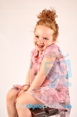 Little Girl Fashion Model In Rose Dress Stock Photo