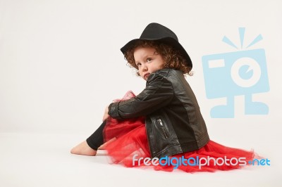 Little Girl Fashion Model With Black Hat Stock Photo