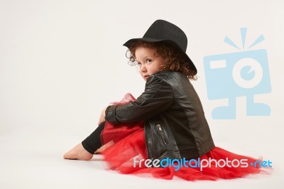 Little Girl Fashion Model With Black Hat Stock Photo