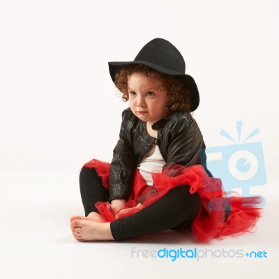 Little Girl Fashion Model With Black Hat Stock Photo