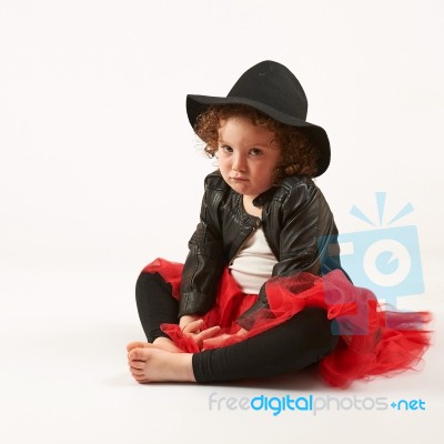 Little Girl Fashion Model With Black Hat Stock Photo