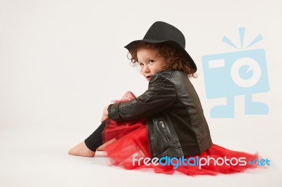 Little Girl Fashion Model With Black Hat Stock Photo