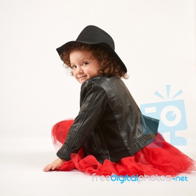 Little Girl Fashion Model With Black Hat Stock Photo