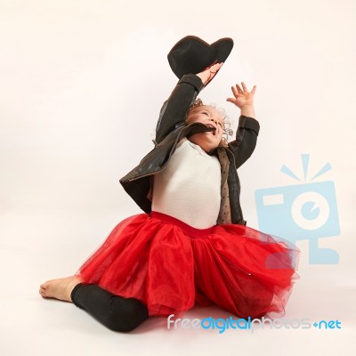 Little Girl Fashion Model With Black Hat Stock Photo