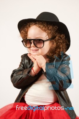 Little Girl Fashion Model With Black Hat Stock Photo