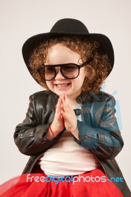 Little Girl Fashion Model With Black Hat Stock Photo