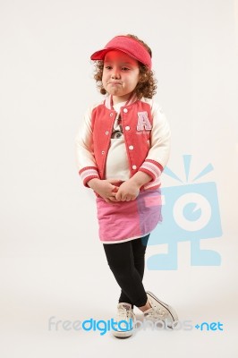 Little Girl Fashion Model With Red Cap Stock Photo