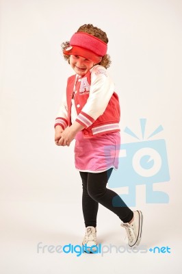 Little Girl Fashion Model With Red Cap Stock Photo