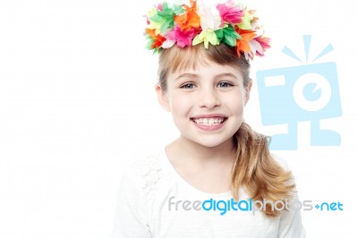 Little Girl In Wreath Of Flowers Stock Photo