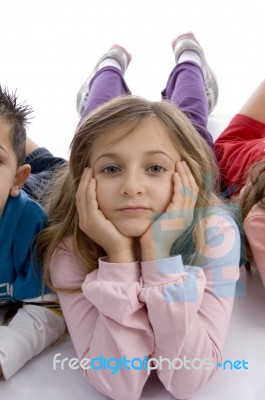 Little Girl Laying Floor Stock Photo