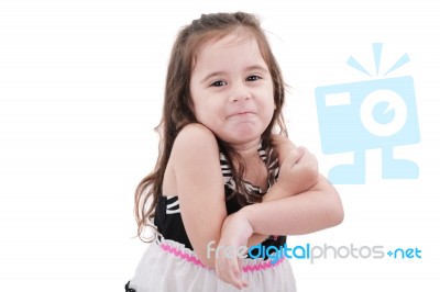 Little Girl Making Funny Face Stock Photo