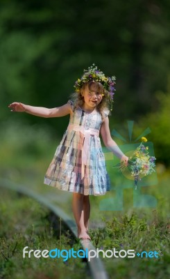 Little Girl Playing On The Railroad Stock Photo