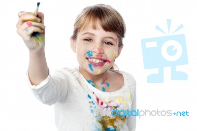 Little Girl Ready To Paint Stock Photo