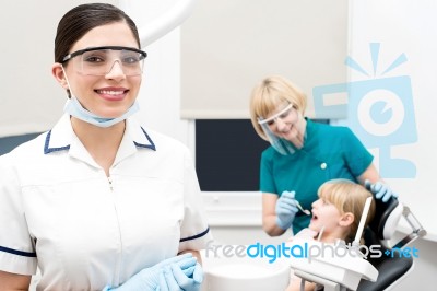 Little Girl Treated At Dental Clinic Stock Photo