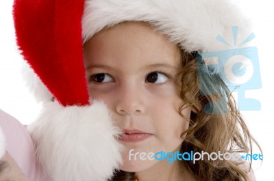 Little Girl Wearing Christmas Hat Stock Photo