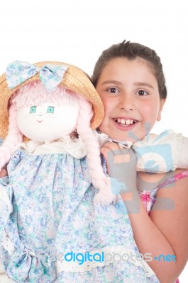 Little Girl With Doll Stock Photo