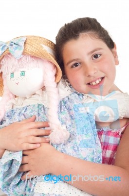 Little Girl With Doll Stock Photo