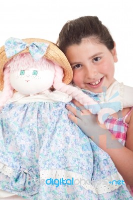 Little Girl With Doll Stock Photo